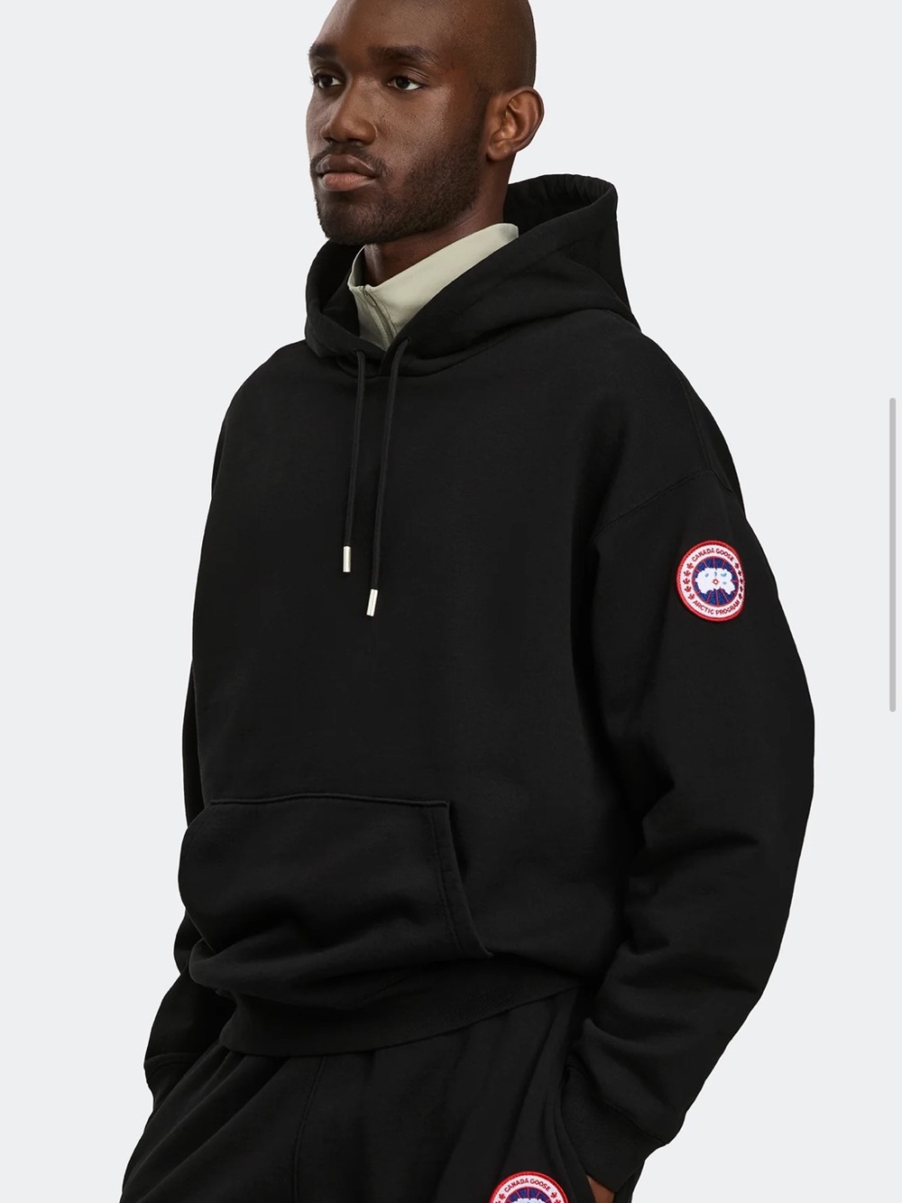 Canada Goose Black Pullover Hoodie with Red & White Sleeve Patch